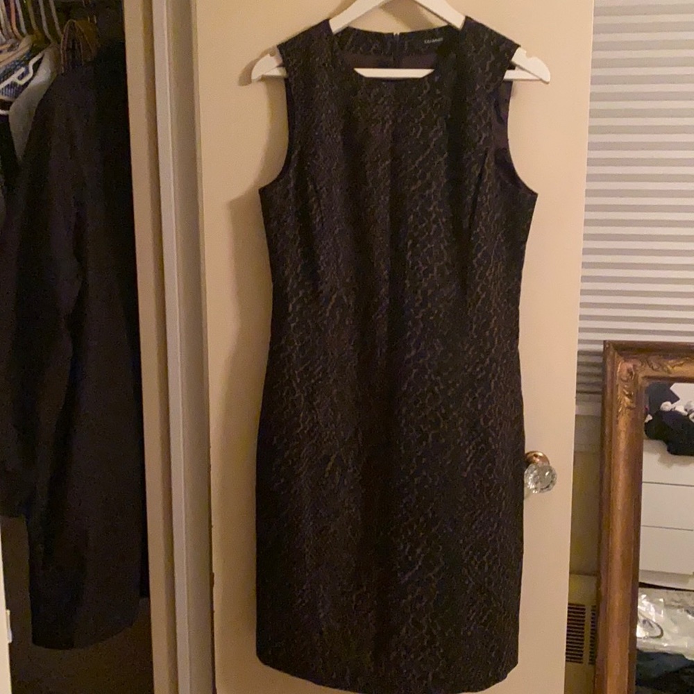 Super chic animal print dress.